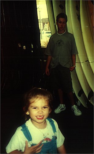 chloe & tyler at a surf shop